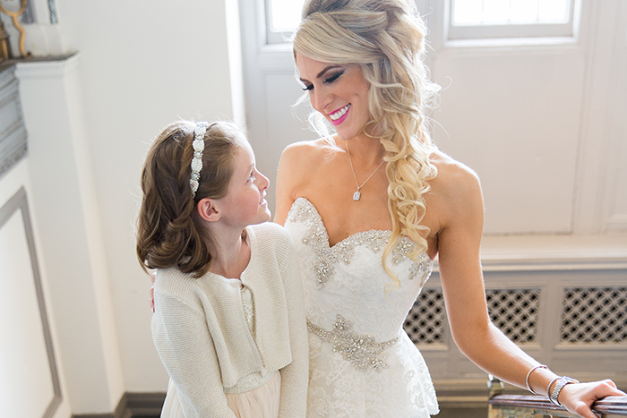 Brittany & Nicholas - Cleveland Elegance | Karen Menyhart Photography | As seen on TodaysBride.com | Cleveland Wedding Photography, Winter wedding ideas, flower girl, bridal hair, side swept bridal hair