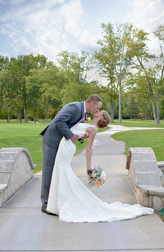 Stacey & Eric - A Cozy Ohio Wedding | Love is All you Need Photography | As seen on TodaysBride.com | Ohio real wedding, wedding dress, illusion neckline wedding gown