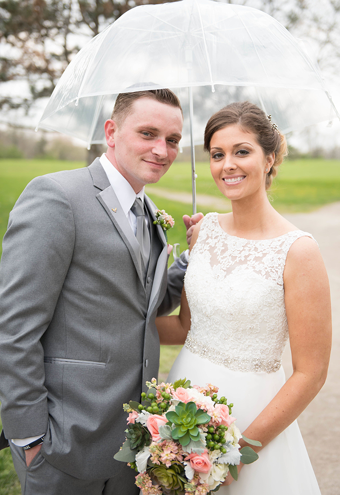 Stacey & Eric - A Cozy Ohio Wedding | Love is All you Need Photography | As seen on TodaysBride.com | Ohio real wedding, umbrella wedding photo ideas, illusion neckline wediding gown, succulent and blush bridal bouquet