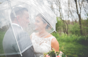 Stacey & Eric - A Cozy Ohio Wedding | Love is All you Need Photography | As seen on TodaysBride.com | Ohio real wedding, umbrella wedding pictures