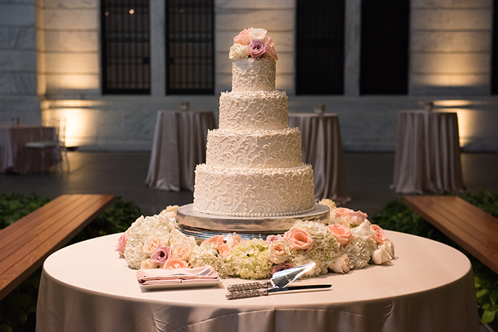 Shannon & Andrew - A Modern Fairy Tale | Photos by New Image Photography | As seen on TodaysBride.com | wedding cake, floral wedding cake, ivory wedding cake