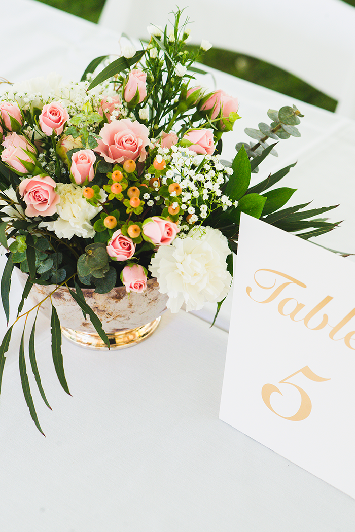 Nicole & Jason - Bright Backyard Wedding | Hai Bales Photography | As seen on Todaysbride.com Real Ohio Weddings | navy and gold wedding, ohio wedding, wedding photography, youngstown wedding, preppy wedding, unique wedding decor, table number, centerpiece