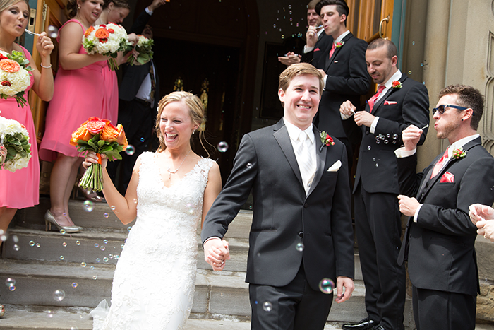 Ashley & Brad - The Club at Key Center Wedding | Orchard Photography | Real Ohio Wedding as seen on Todaysbride.com | Cleveland wedding, wedding photography, ceremony exit