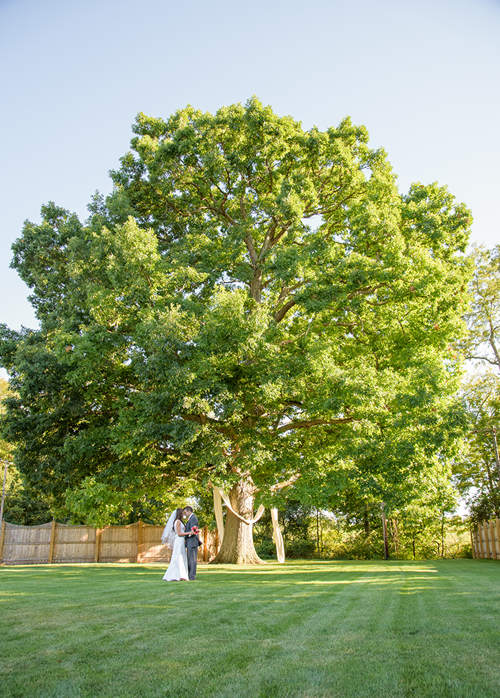 Katie & Greg - Coral & Cranberry Wedding | Sabrina Hall Photography, Real Wedding as seen on TodaysBride.com. coral and cranberry wedding, wedding inspiration,