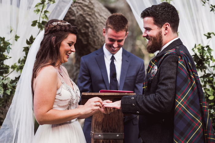 Bride and groom exchanging rings | John Patrick Images | As seen on TodaysBride.com