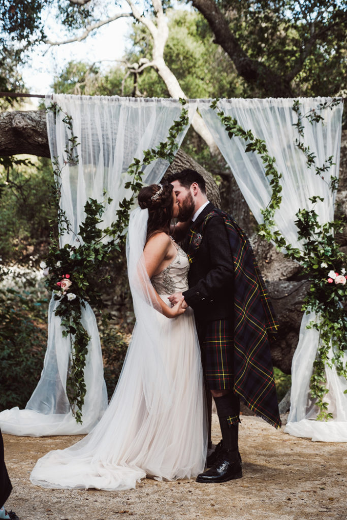 Bride and groom first kiss | John Patrick Images | As seen on TodaysBride.com