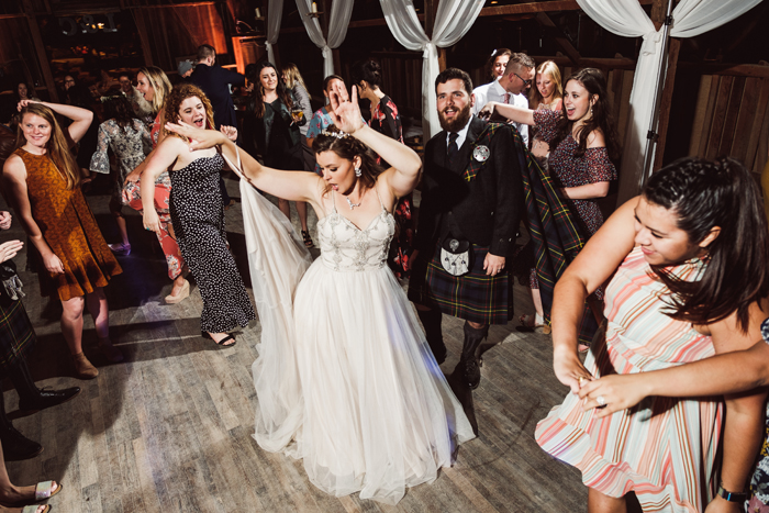 Bride dancing at wedding | John Patrick Images | As seen on TodaysBride.com