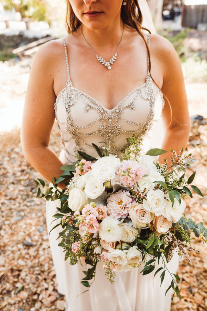 Bride holding flowers | John Patrick Images | As seen on TodaysBride.com