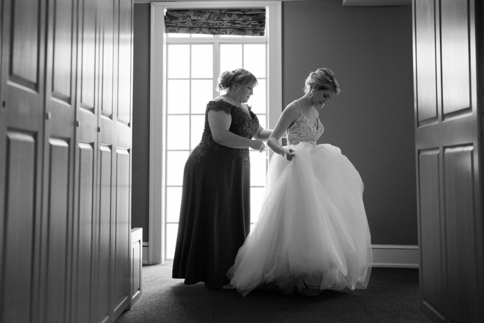 Bride and her mom trying on wedding dress | Sabrina Hall Photography | As seen on TodaysBride.com