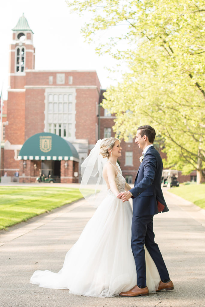 Bride and Groom in front of Glenmoor Country Club | Sabrina Hall Photography | As seen on TodaysBride.com