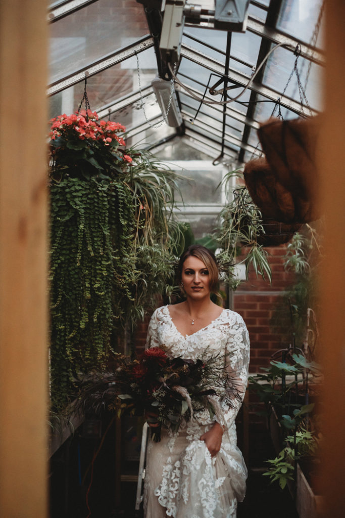 Bride in a greenhouse | Nichole Coyle Photography | As seen on TodaysBride.com