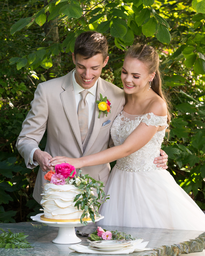 Bride and Groom cutting cake | OH Snap! Photography | As seen on TodaysBride.com