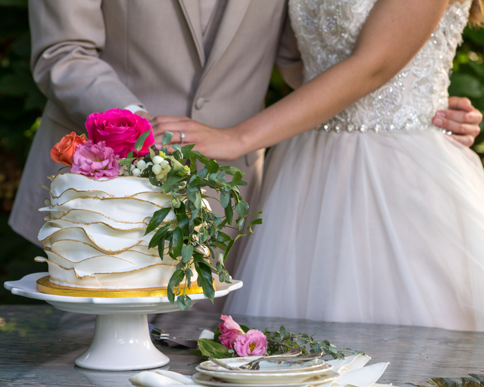 Bride and Groom cutting cake | OH Snap! Photography | As seen on TodaysBride.com