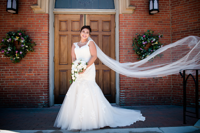 Bride in front of church | Artistic Photography by Glenda | As seen on TodaysBride.com