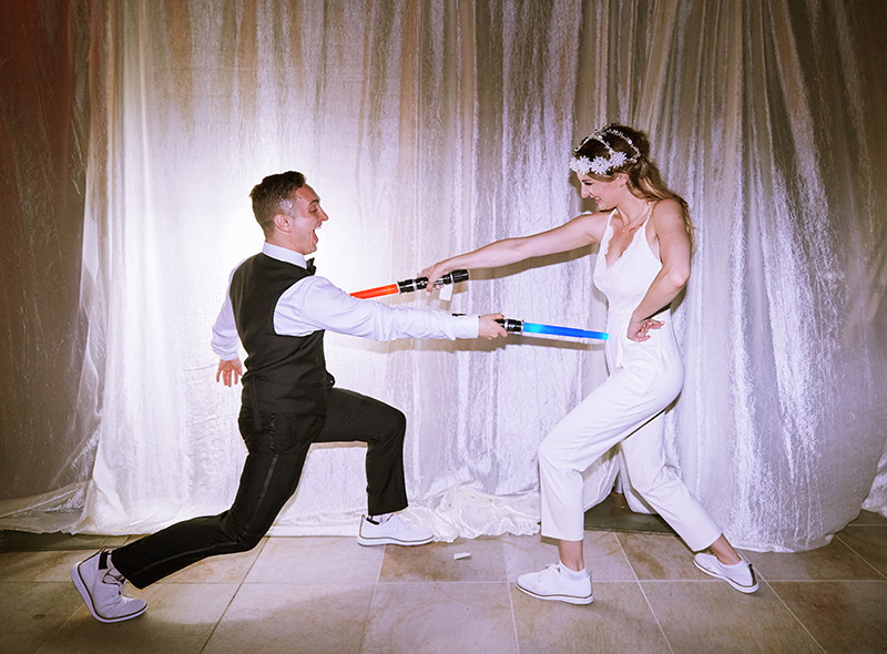 Bride and Groom Lightsaber Duel | Stephany Perea | As seen on TodaysBride.com