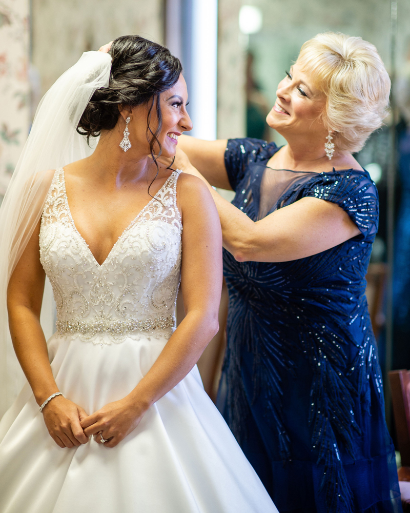 Mother Daughter Getting Dressed | Klodt Photography | as seen on TodaysBride.com