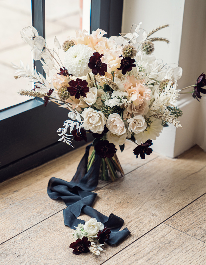 Wedding bouquet with dried flowers and ribbon