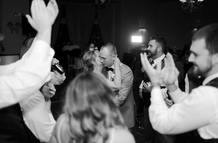 Wedding guests dancing at reception