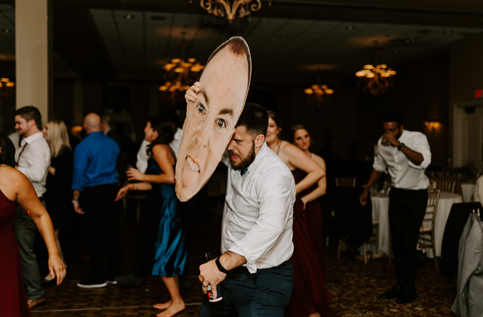 Wedding guests dancing at reception