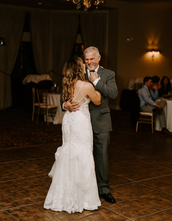 Father of the bride dancing at wedding