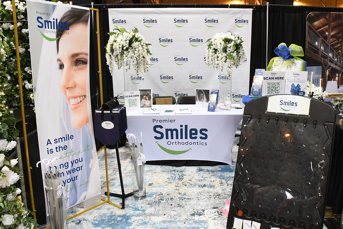 Premier Smiles orthodontics display at the bridal show 