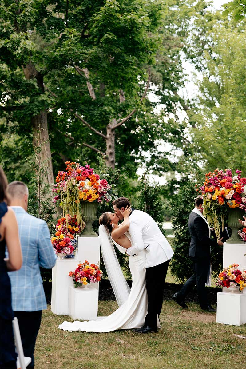 kissing at wedding ceremony