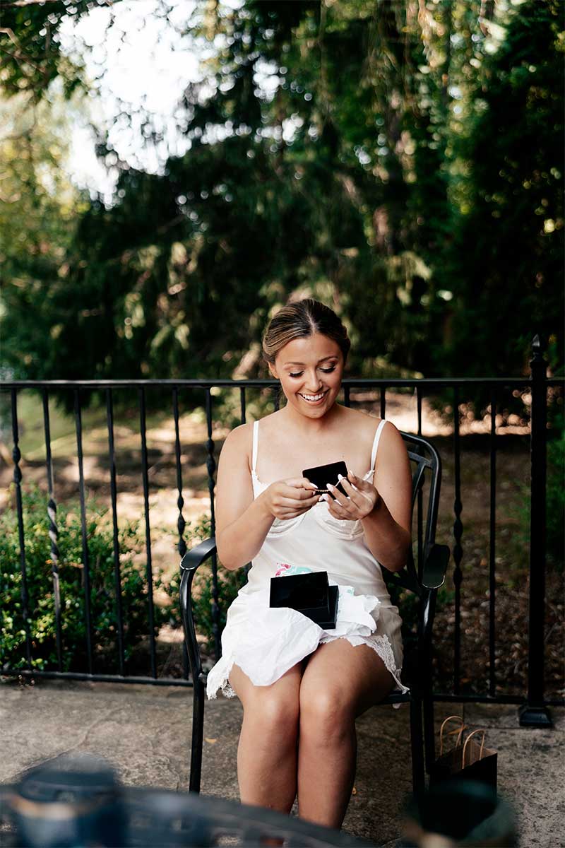 Bride opening wedding day gift