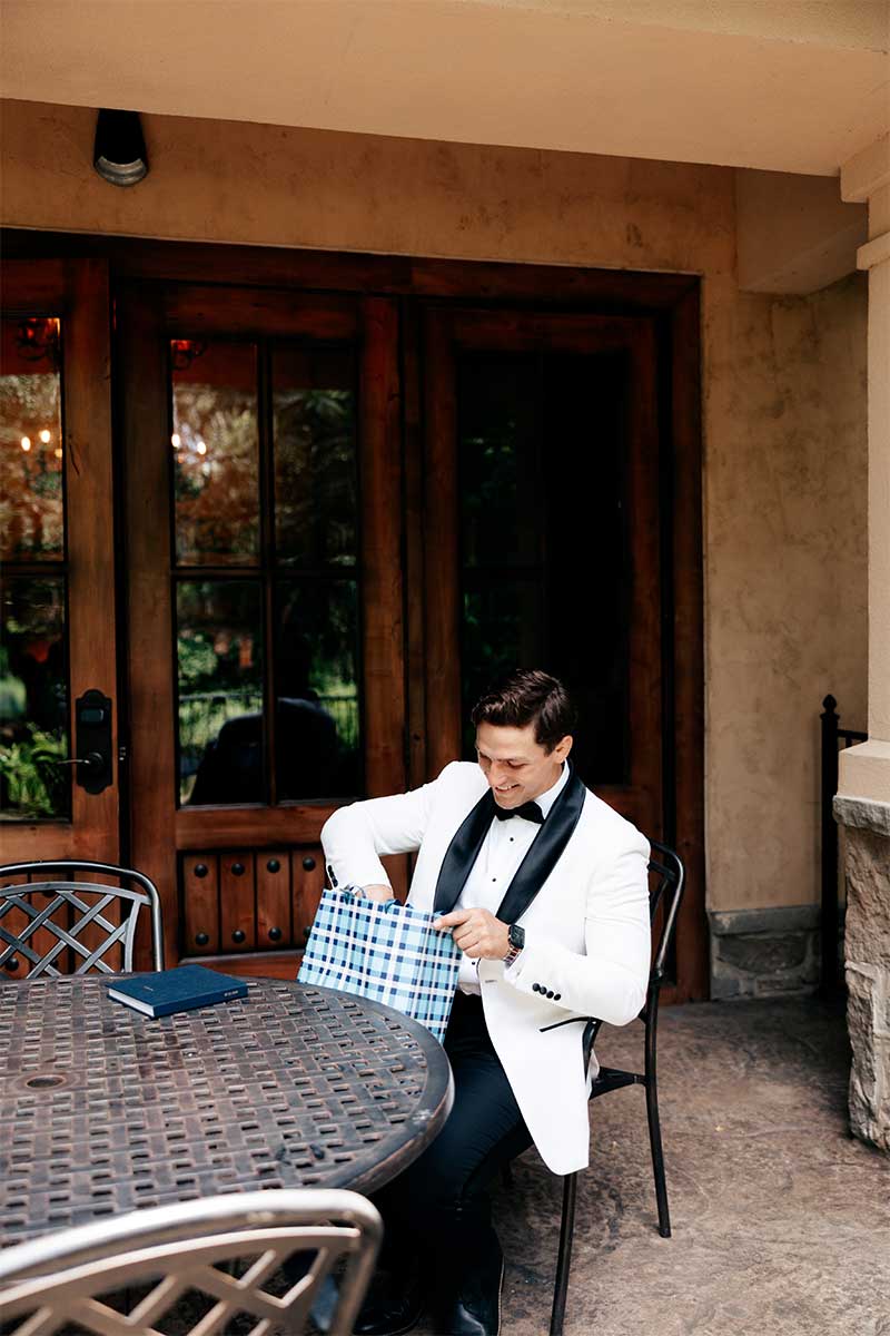 groom opening gift