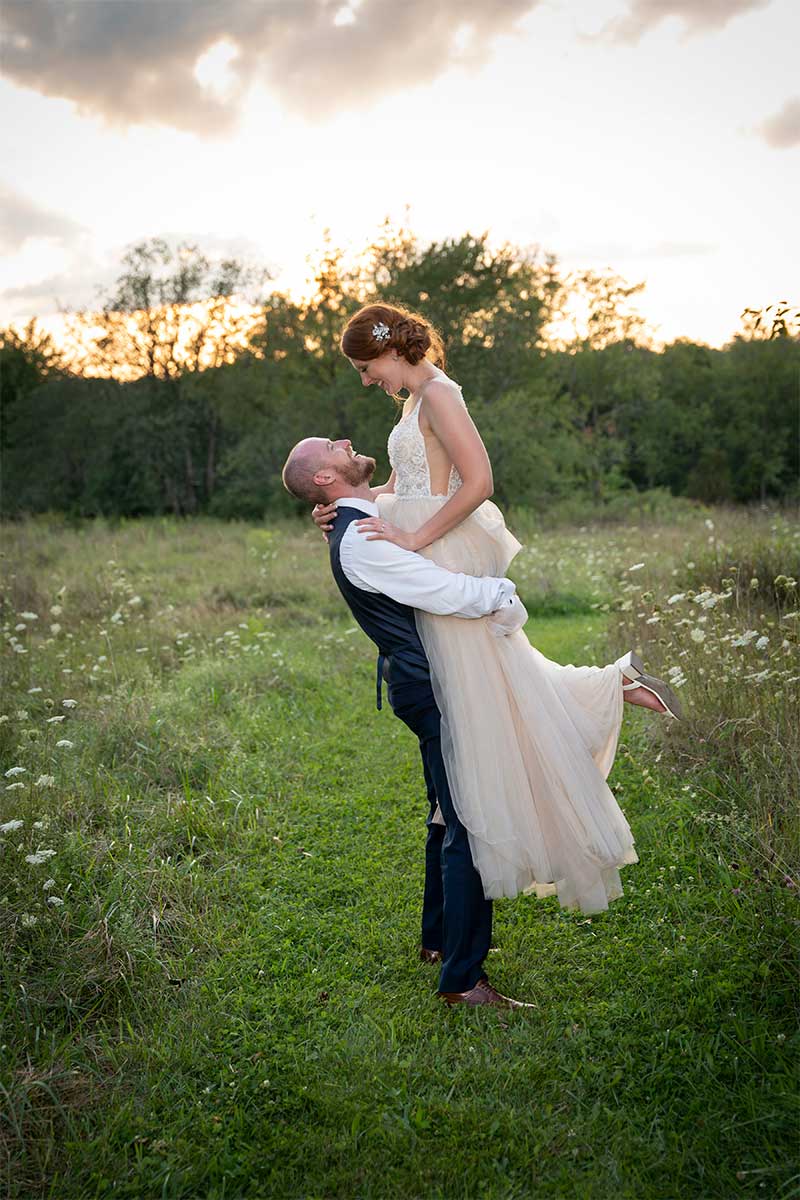 couple portrait lifting