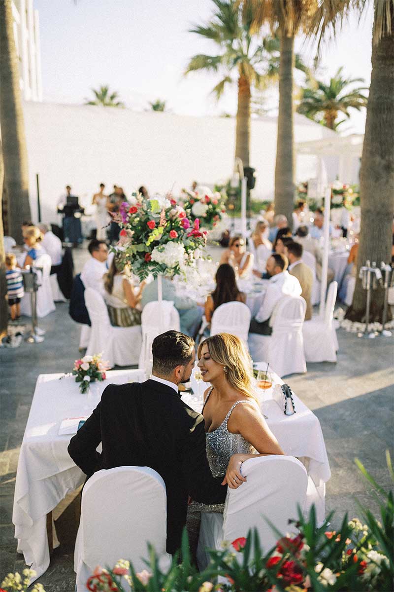 couple eating together at wedding