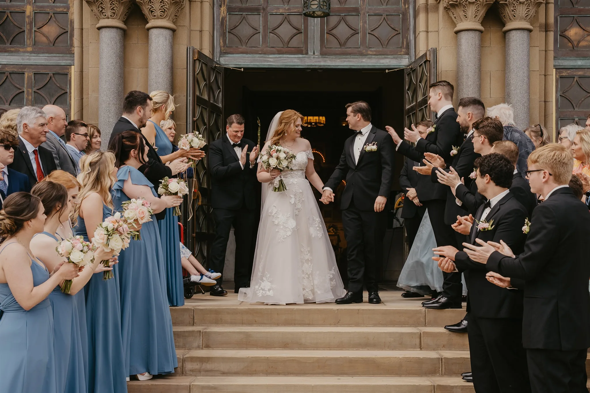 bride and groom outside of church