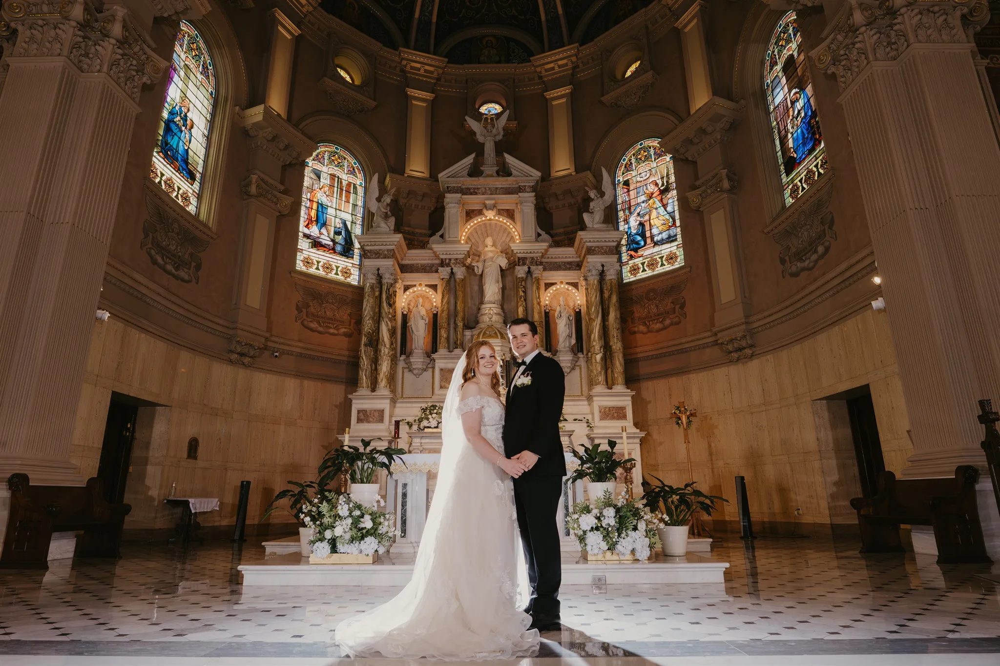 bride and groom portraits inside wedding ceremony in a church